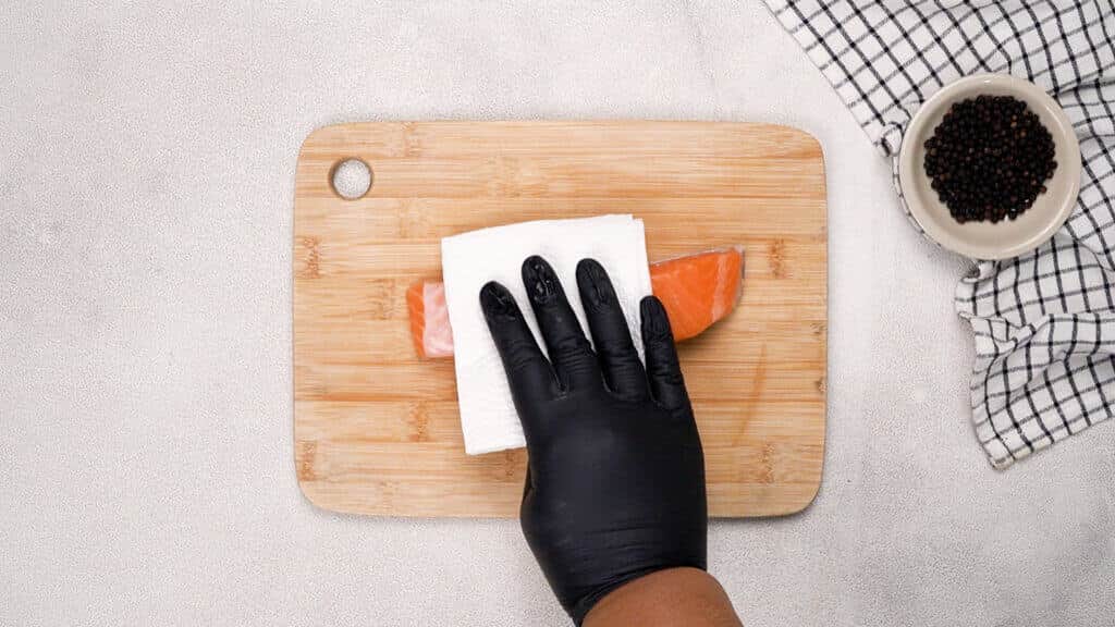 Pat the fish dry with paper towel