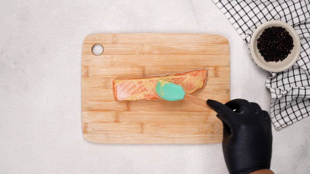 Spread a thin layer of mustard