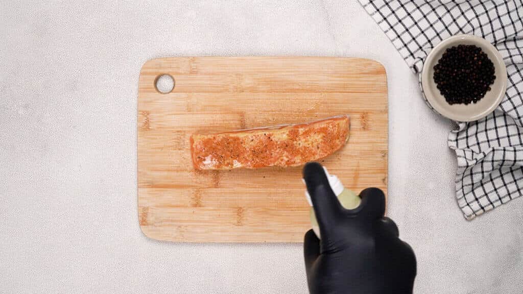 Lightly spray with olive oil.