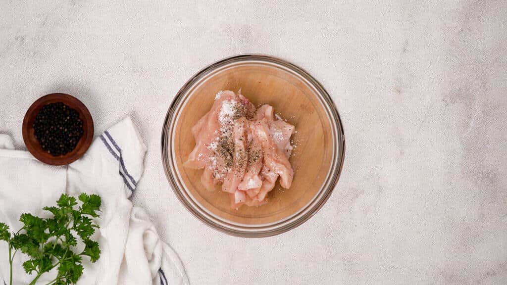 Chicken with spices in a bowl