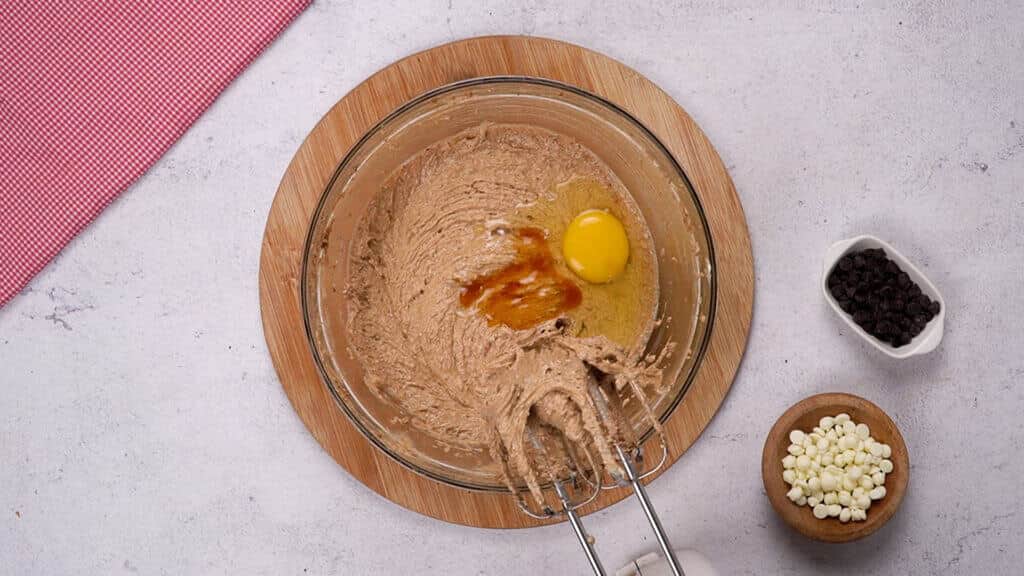 Add egg, vanilla, to the mixture