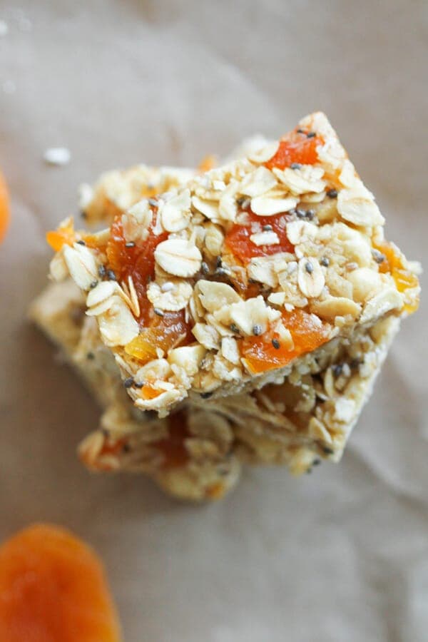 chewy apricot muesli bars stacked on top of each other