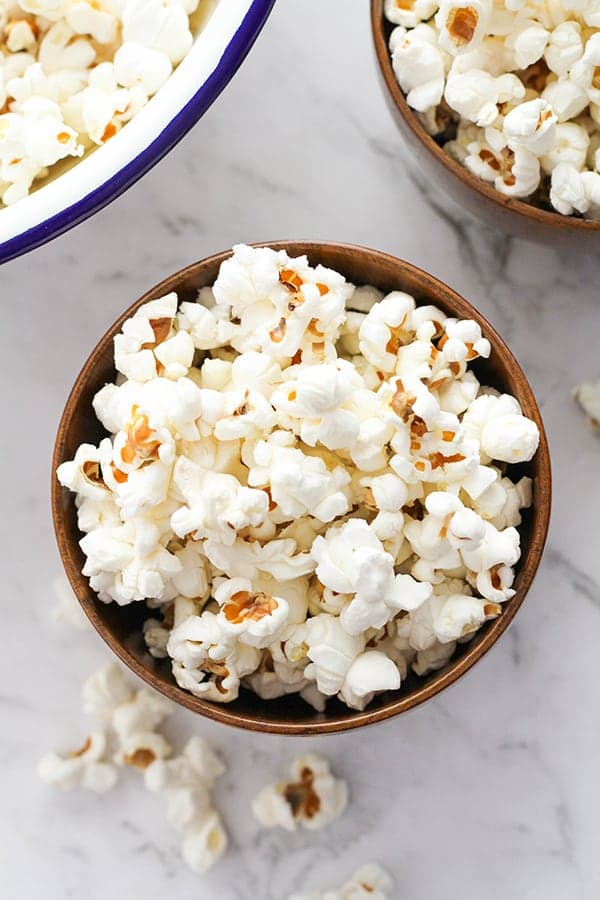popcorn in a wooden bowl.