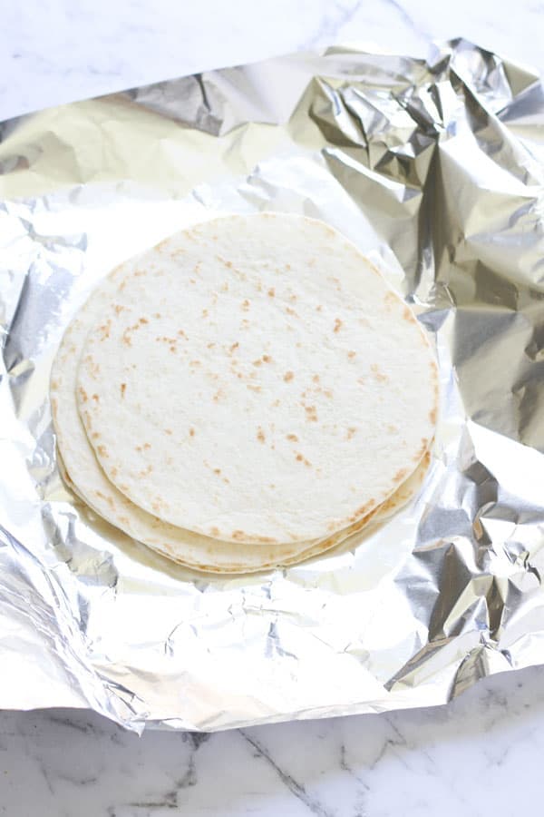 mini flour tortillas on top of alfoil