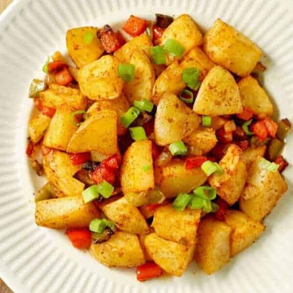 close up on a plate of crispy breakfast potatoes