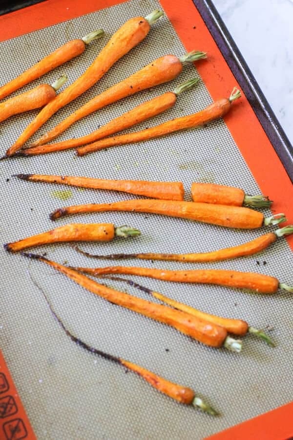 roasted carrots on a baking tray