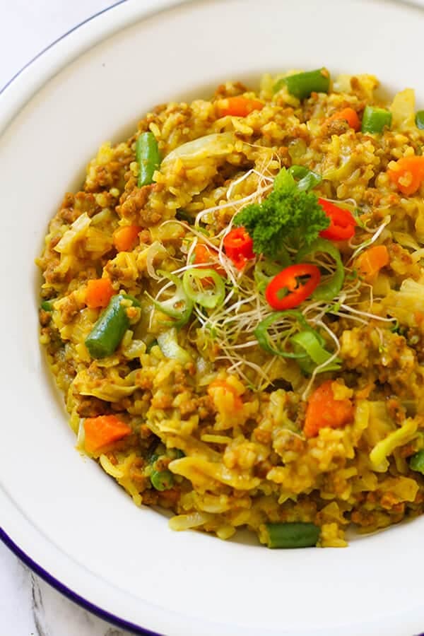 beef chow mein on a white plate.