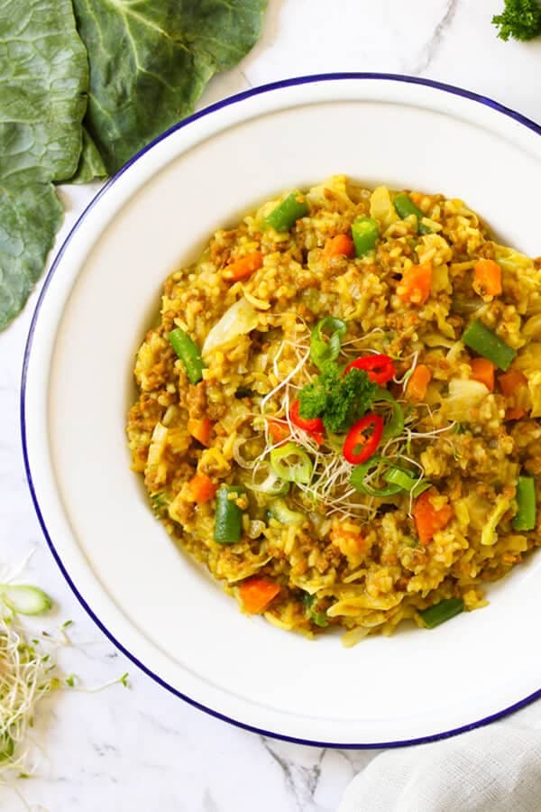 beef chow mein on a white plate.