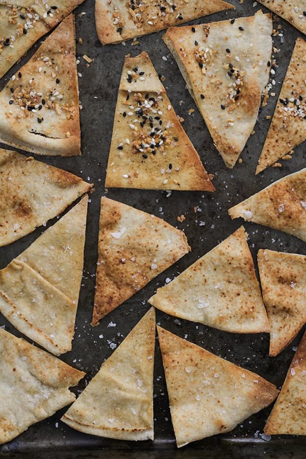 baked pita chips on a baking tray.