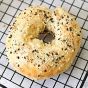 2 Ingredient Bagels on a wire cooling rack.