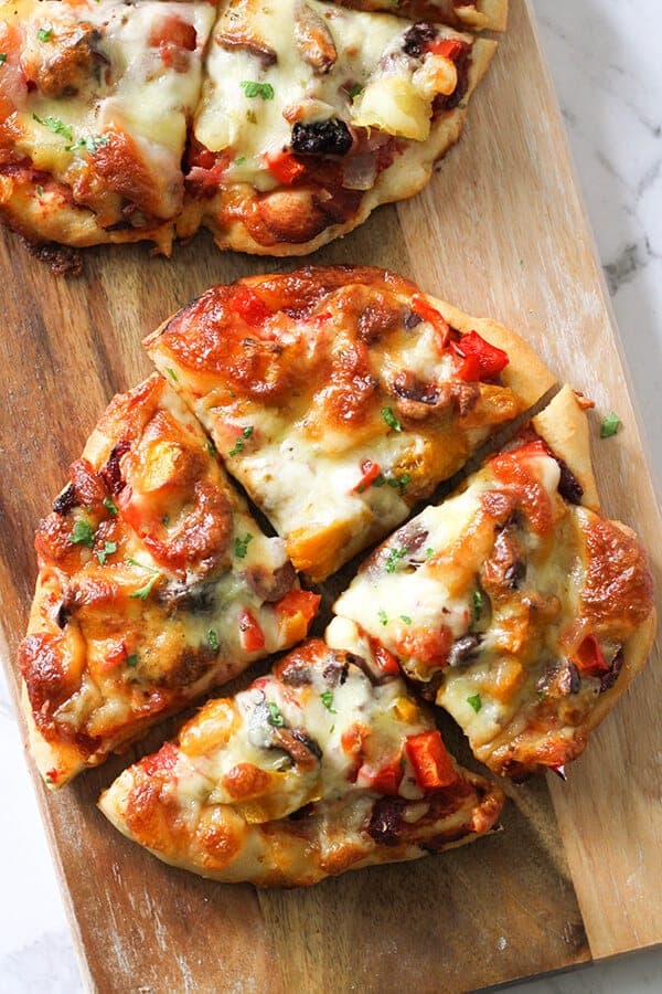 Roast Pumpkin Pizza on a wooden serving board.
