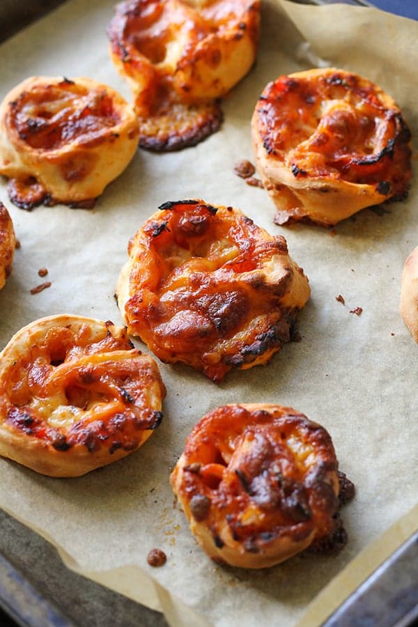 pizza scrolls on a baking tray.