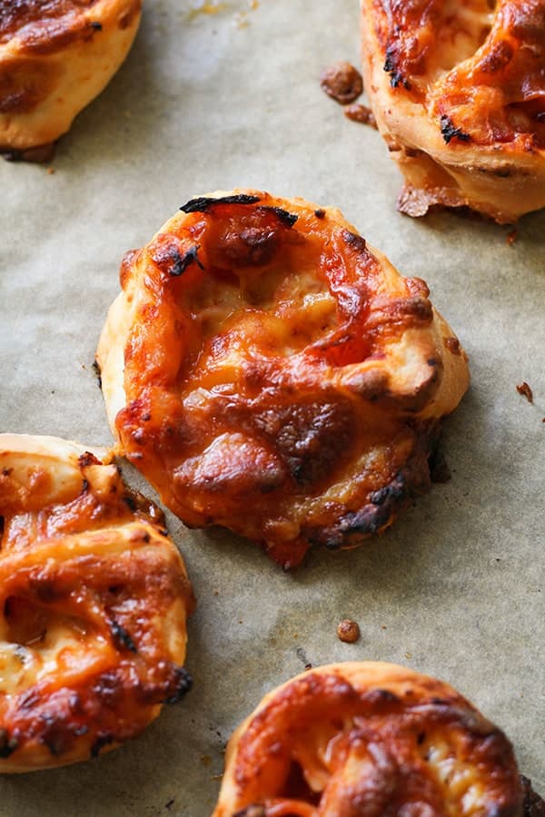 pizza scrolls on a baking tray.