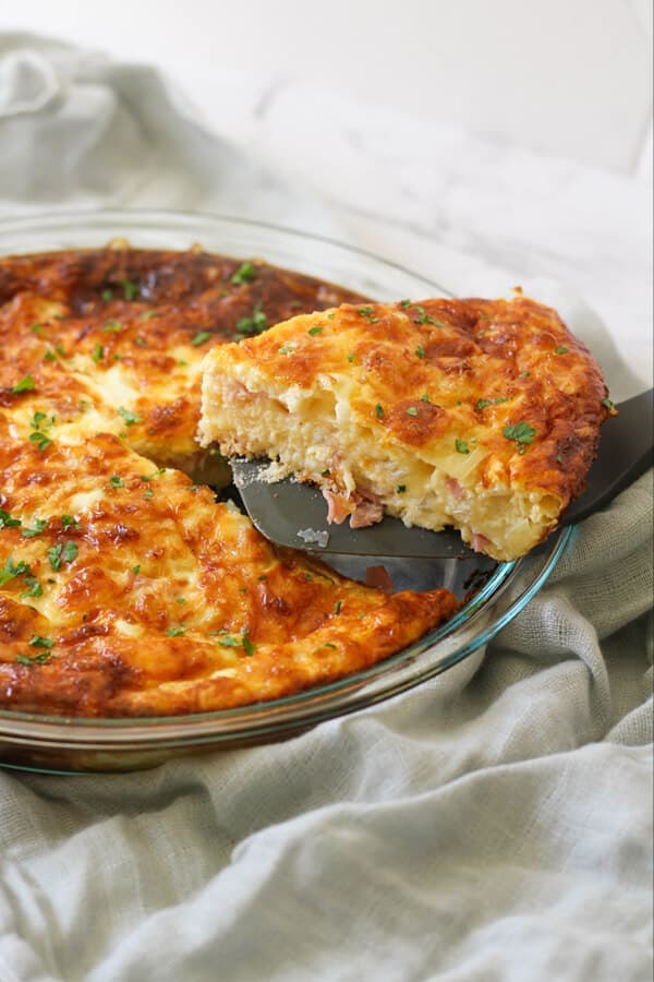 Impossible Quiche in a glass pie dish.