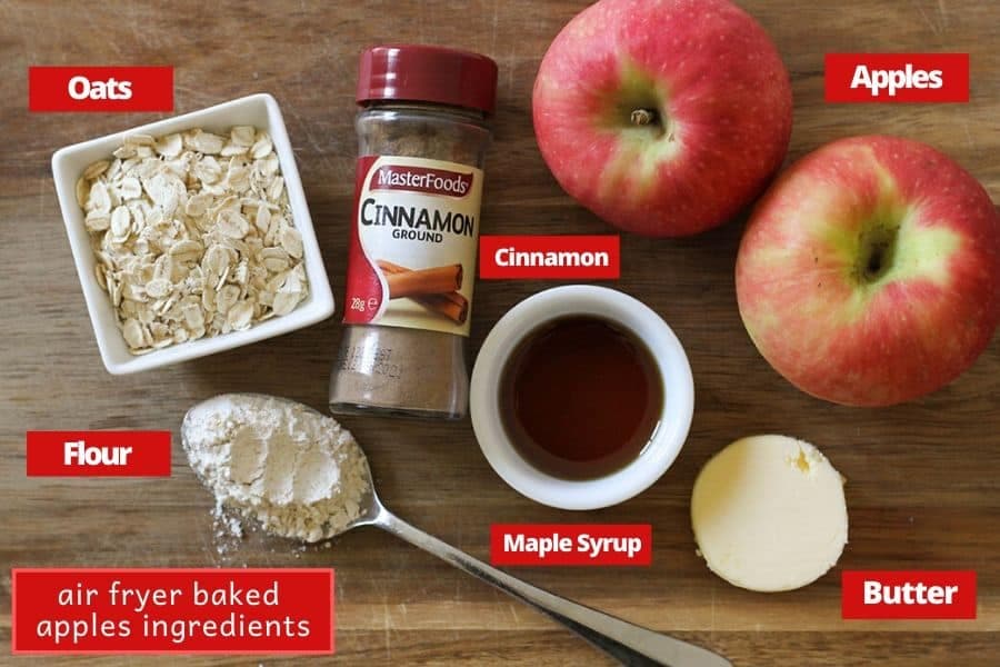ingredients for air fryer baked apples on a wooden board.