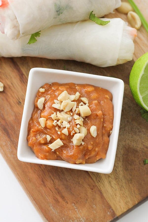 peanut hoisin sauce in a small square white bowl.