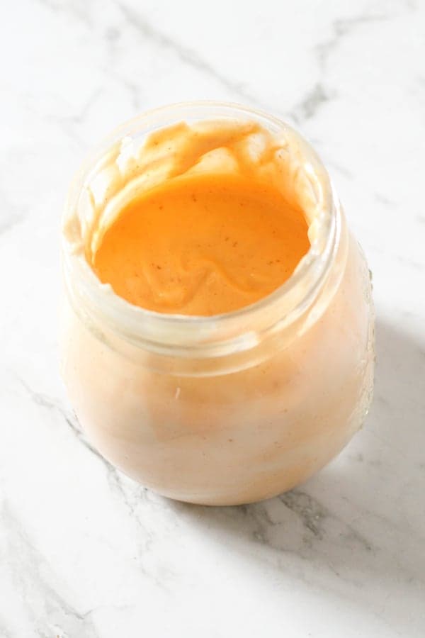 spicy mayonnaise in a glass jar.