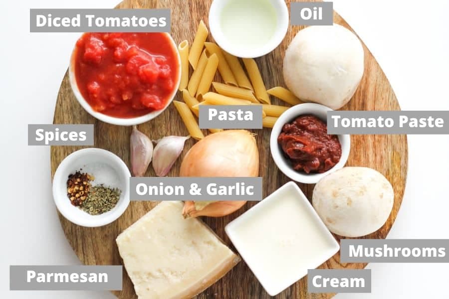 ingredients laid on top of a wooden serving board.