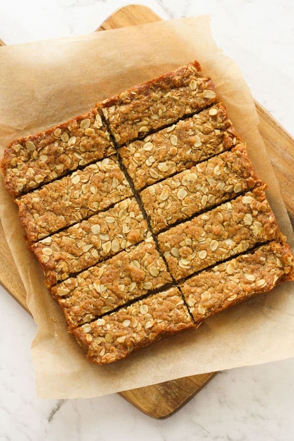anzac slices on a wooden board.