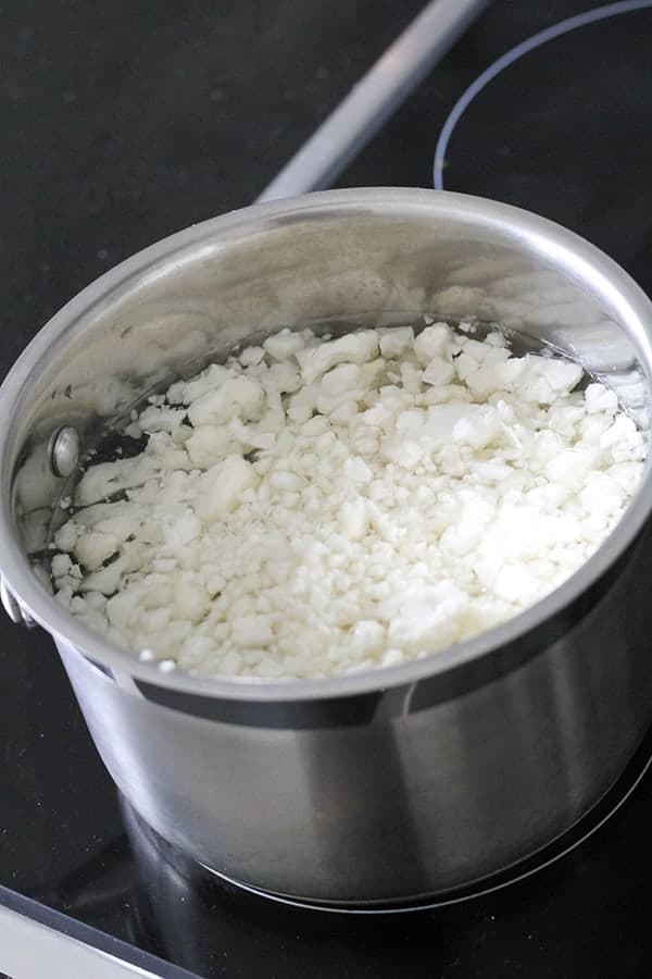 cauliflower in a saucepan of water. 