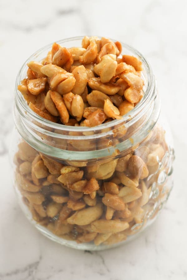 honey roasted peanuts in a glass jar.