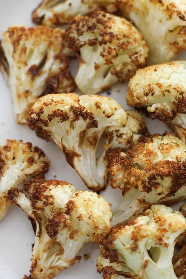 roasted cauliflower on a white plate.