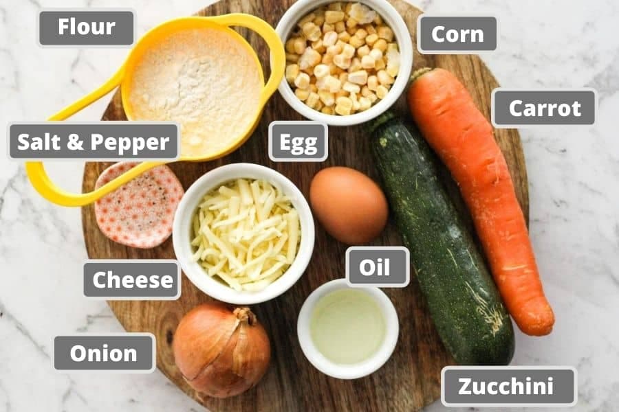 fritter ingredients on a wooden board. 