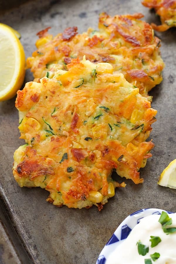 vegetable fritters on a baking tray.