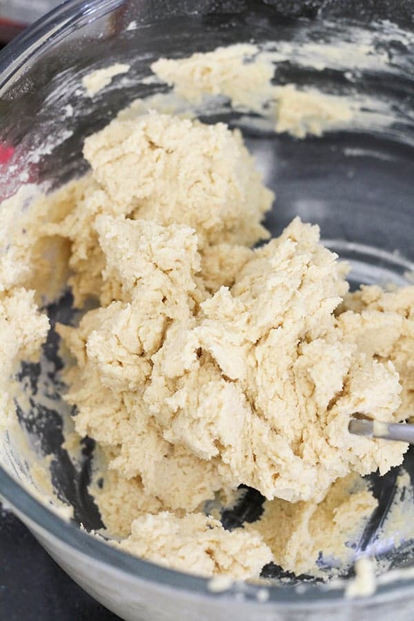 dough in a glass bowl. 