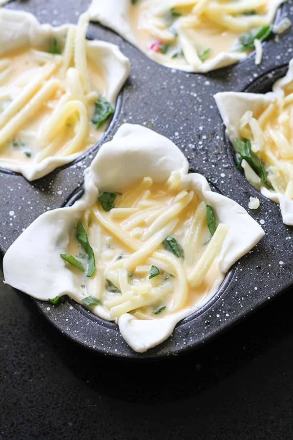 puff pastry cases filled with vegetables, eggs and cheese.