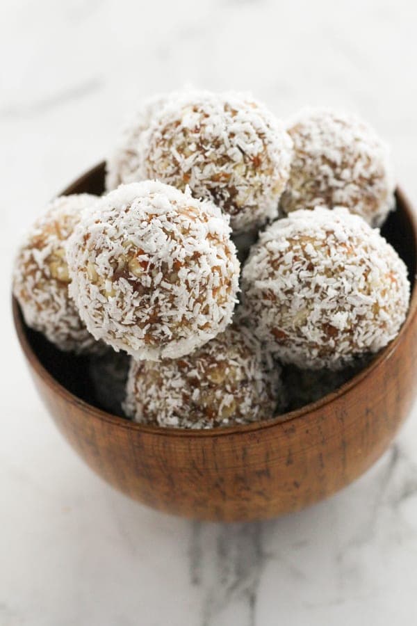 energy balls in a wooden bowl.