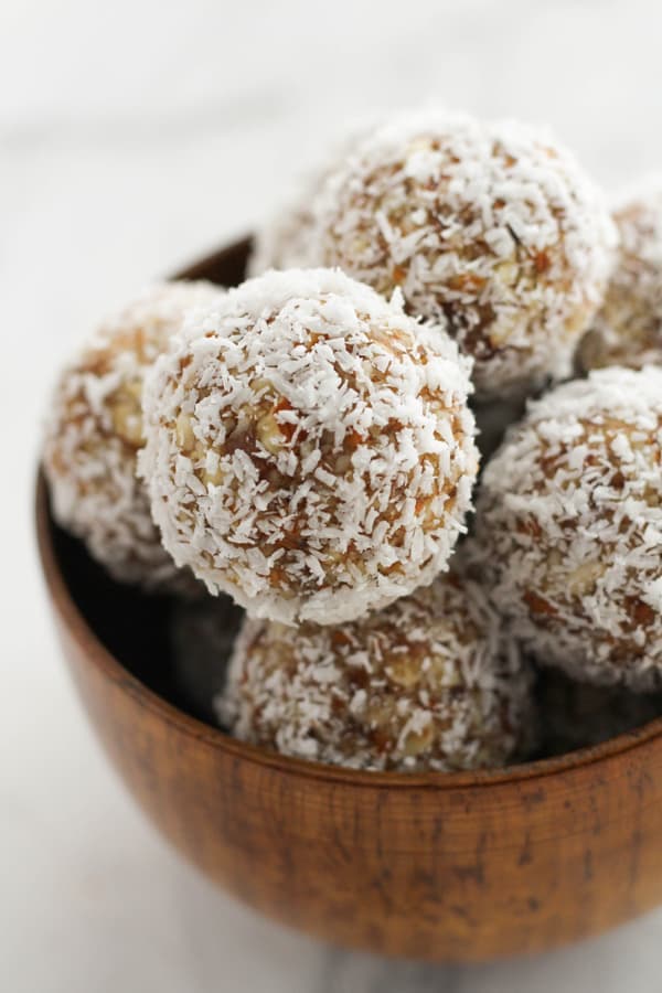 energy balls in a wooden bowl.