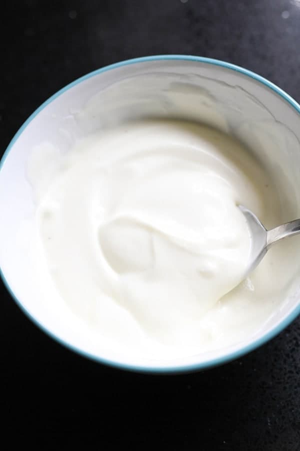 garlic sauce in a white bowl.