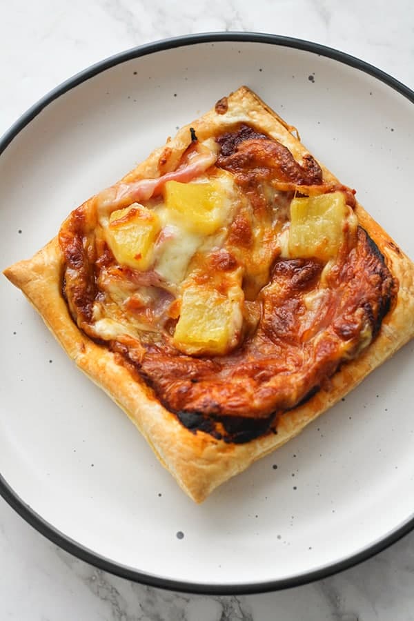 pizza on a white plate.