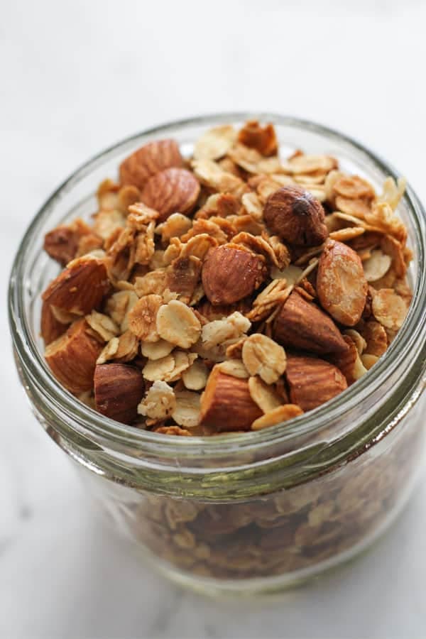 air fryer granola in a glass jar.