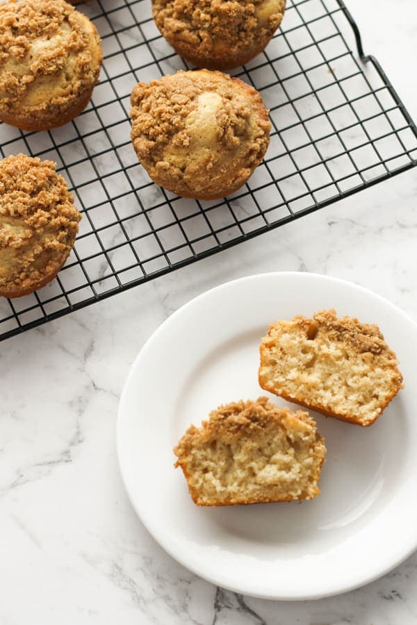 muffins on a wire cooling rack and plates.