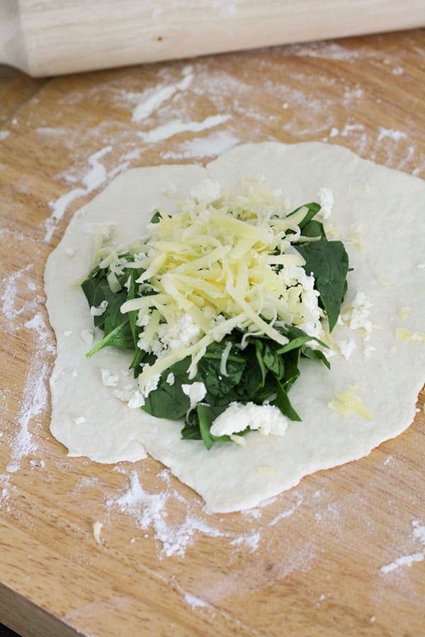 dough filled with spinach, feta and cheddar cheese.
