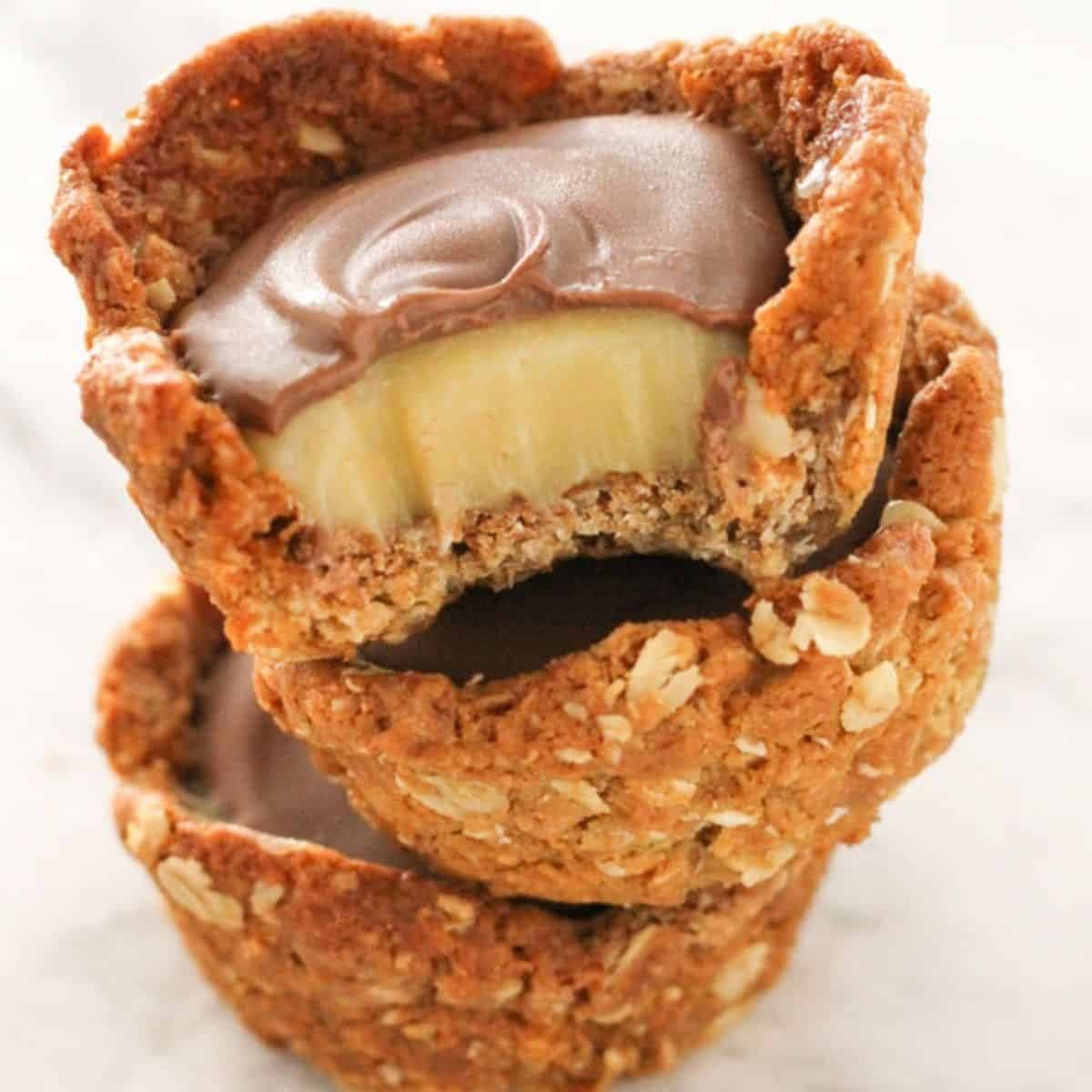 caramel tarts stacked on top of each other.