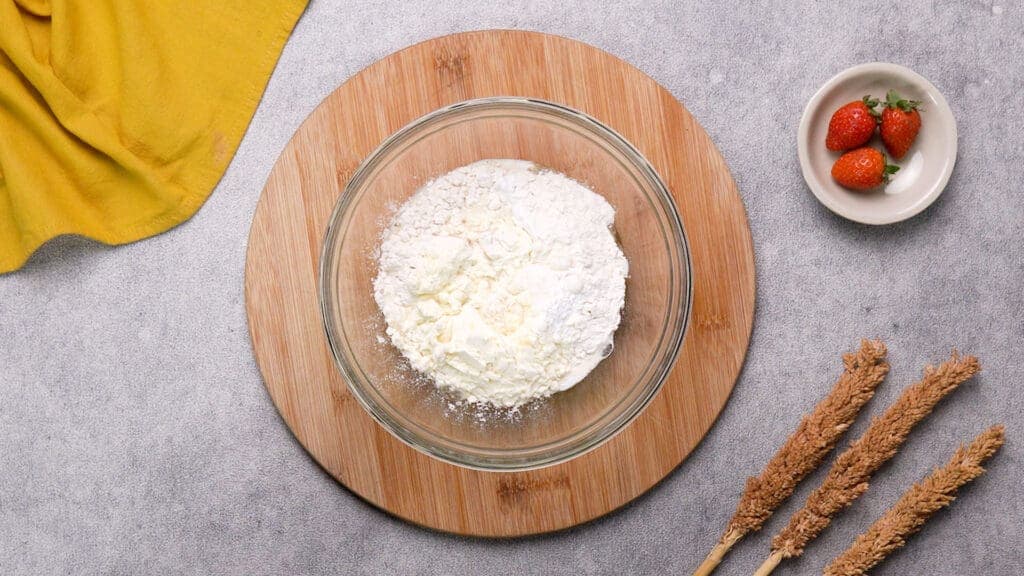 A large bowl contains ingredients