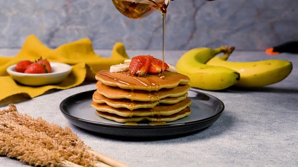 Protein pancakes topped with maple syrup