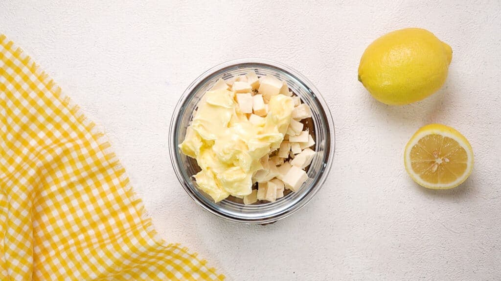 Butter and white chocolate in small bowl