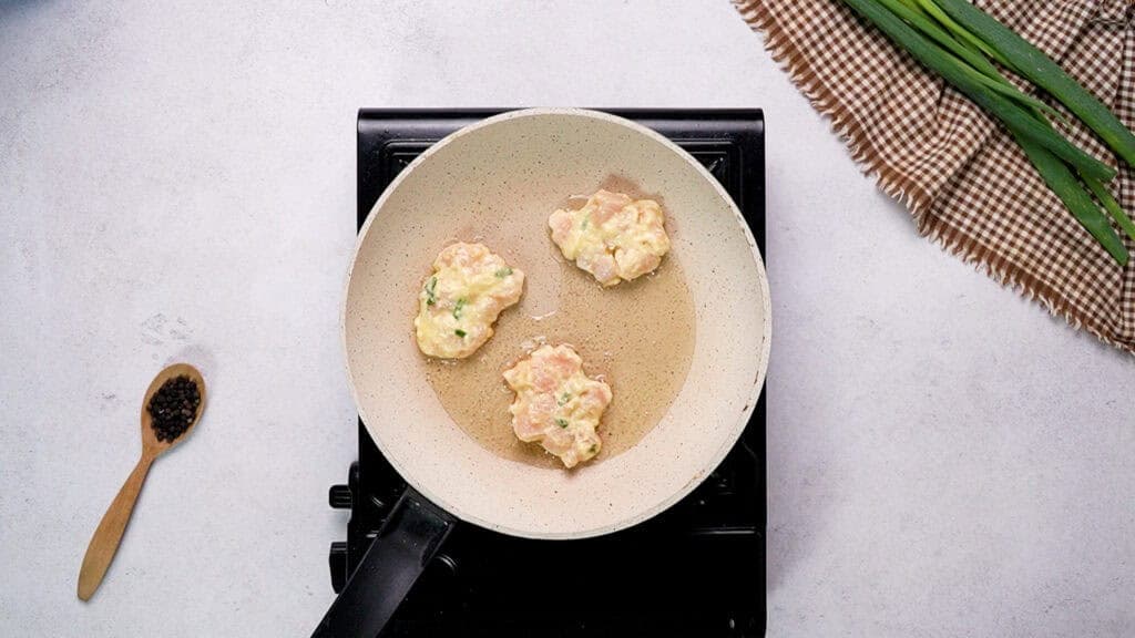 Mixture on hot pan with olive oil