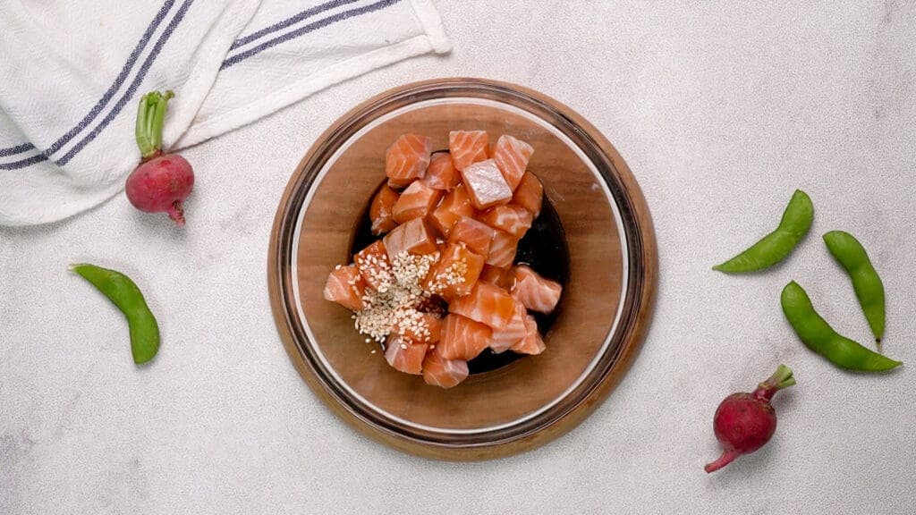 salmon and other ingredients in the bowl
