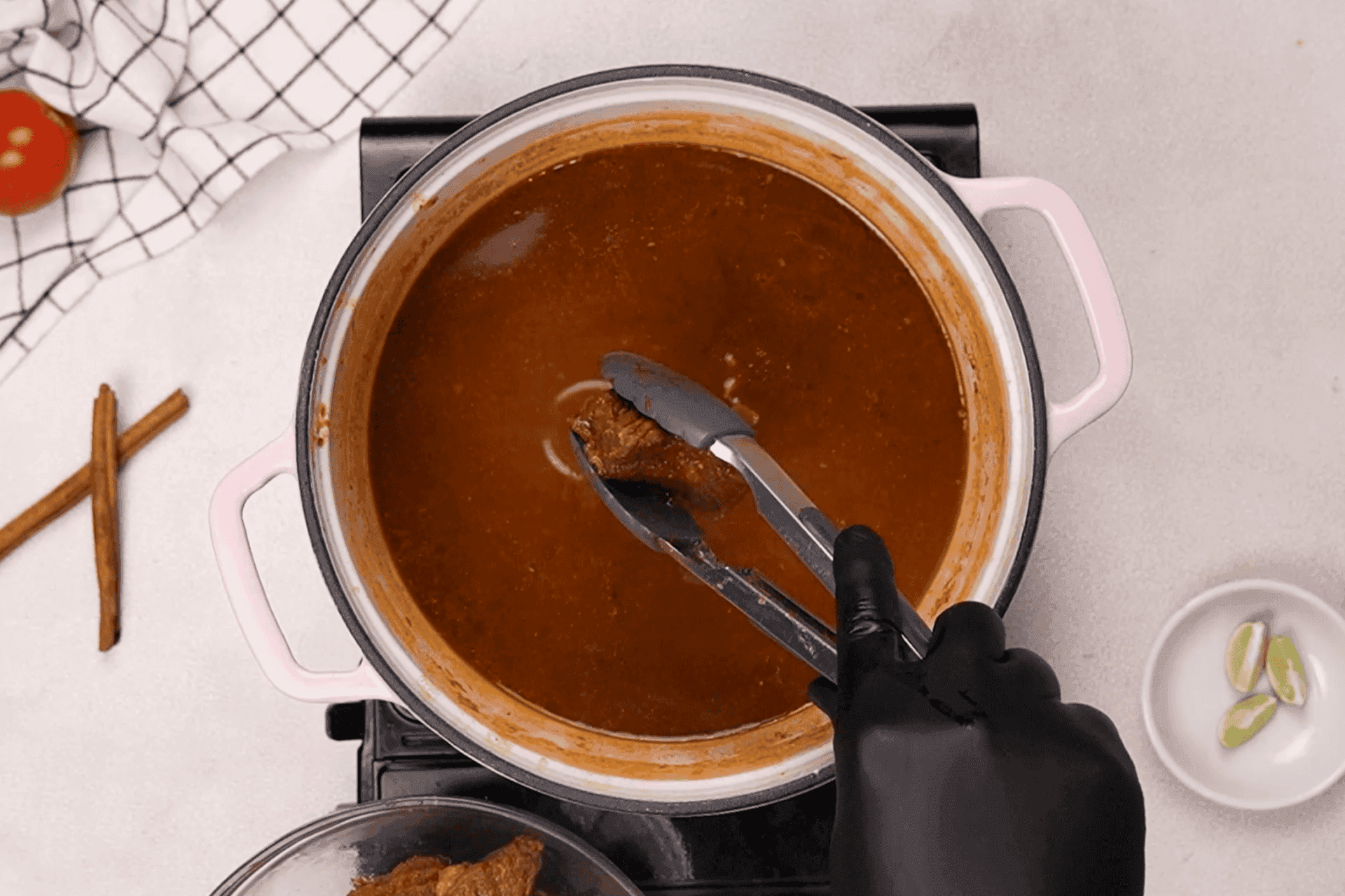 Set aside the consommé or sauce liquid from the beef.