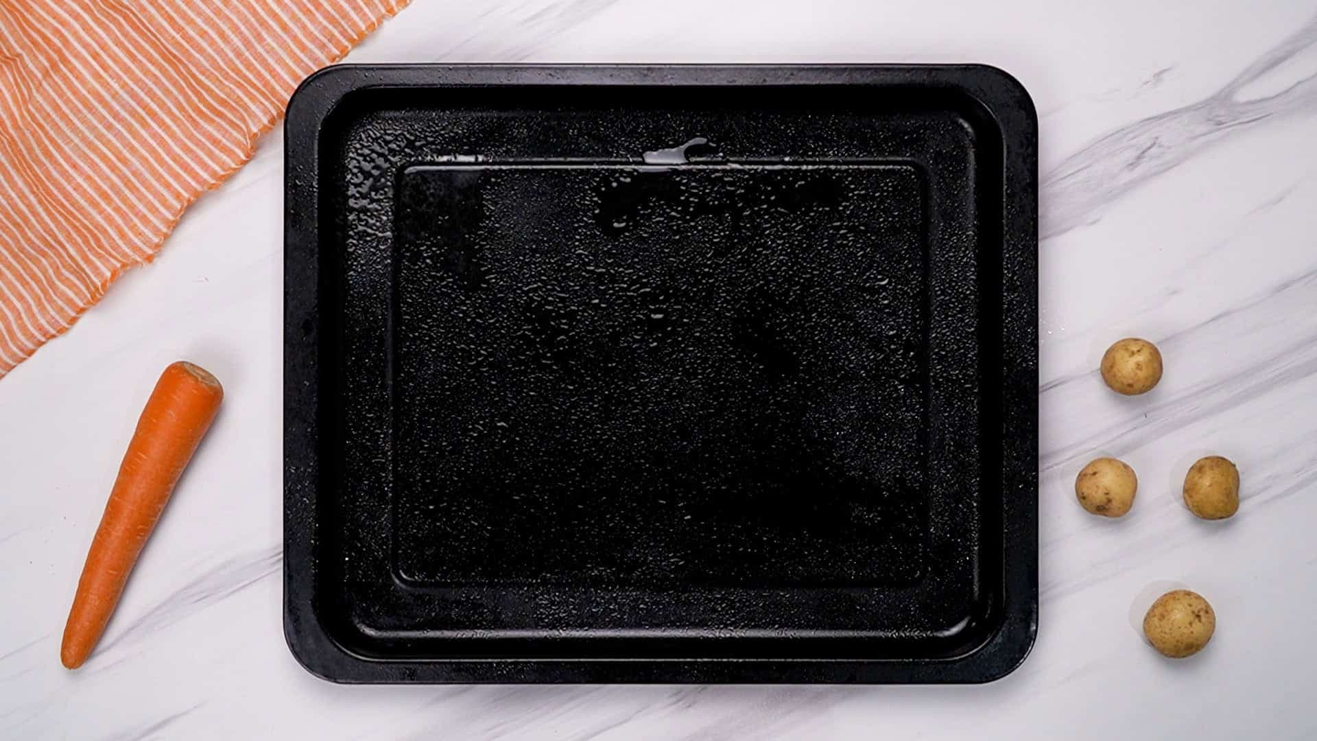 Start by preheating your oven to 400°F (200°C). Lightly coat a baking sheet with cooking spray (if you prefer, you can also line the sheet with foil for even easier clean-up).