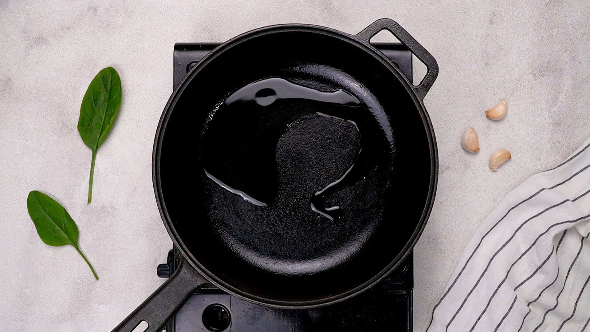 Heat the olive oil in a large skillet over medium-high heat.