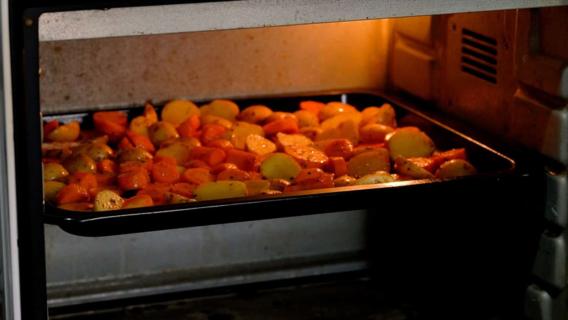 Roast for 30–40 minutes, flipping halfway through, until the vegetables are tender and golden. 