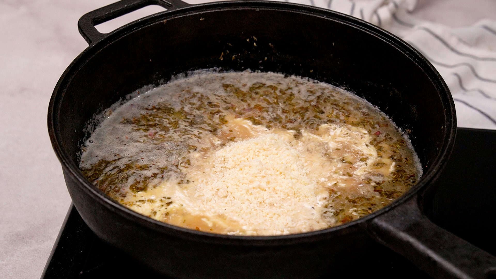 Now, stir in the heavy cream and Parmesan cheese. Let it simmer for another 2 minutes.