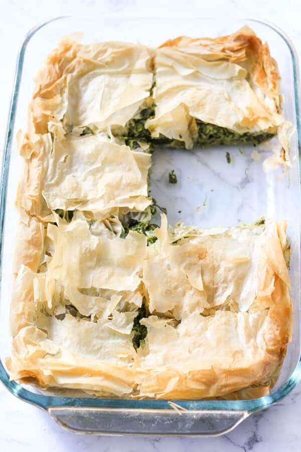 a tray of freshly baked spanakopita.