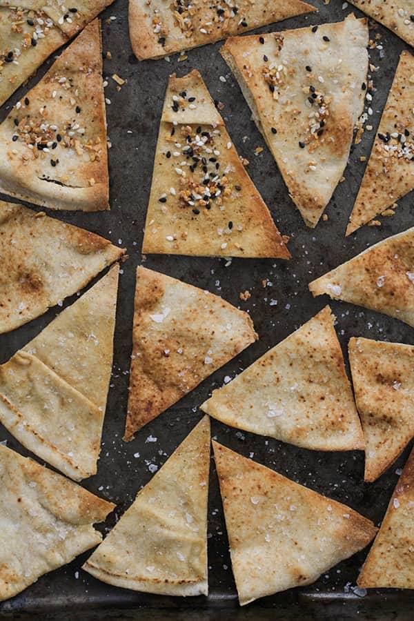 baked pita chips on a baking tray.